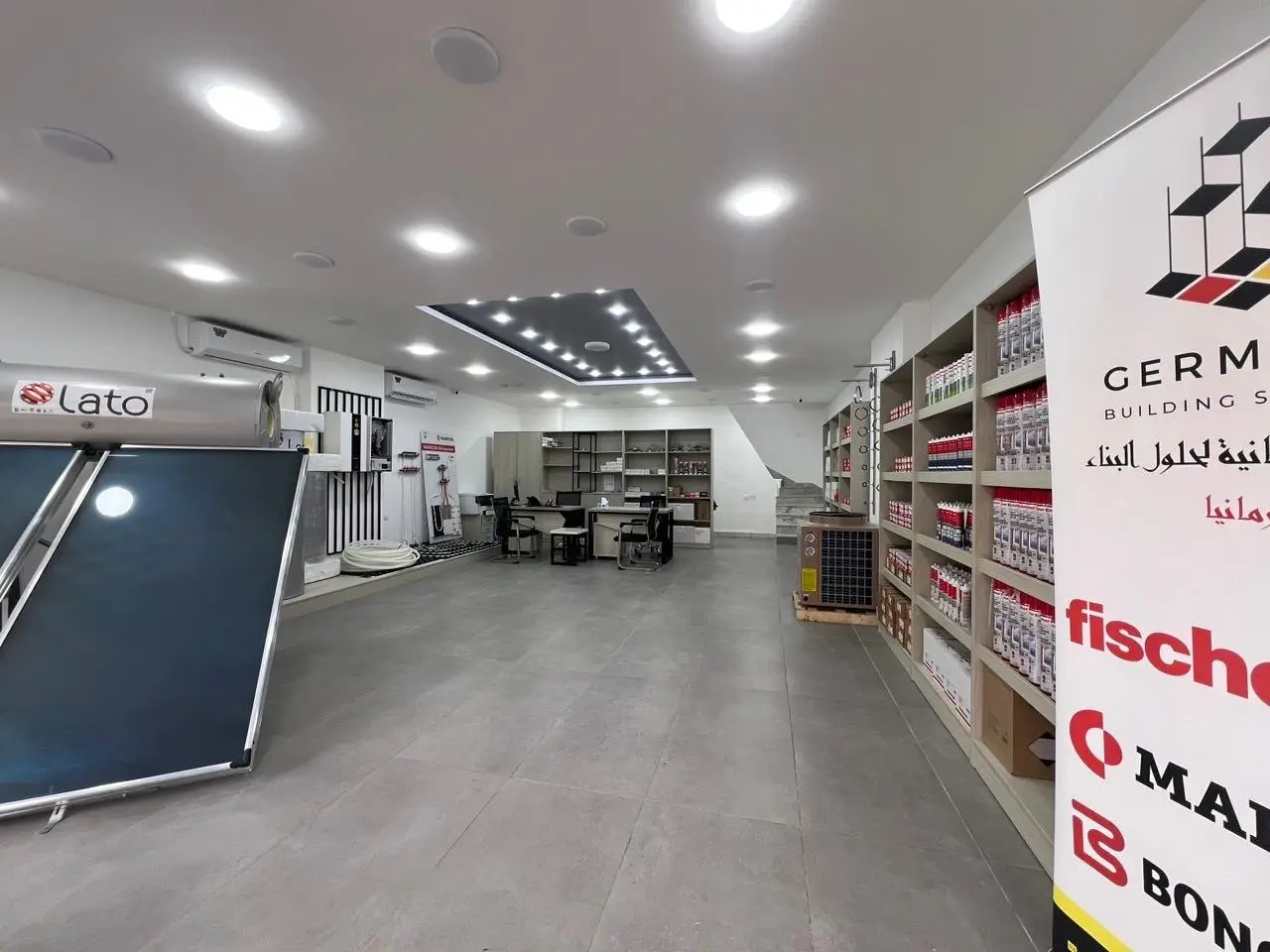 Shelves of heating and plumbing components in the Germania Building Solutions showroom